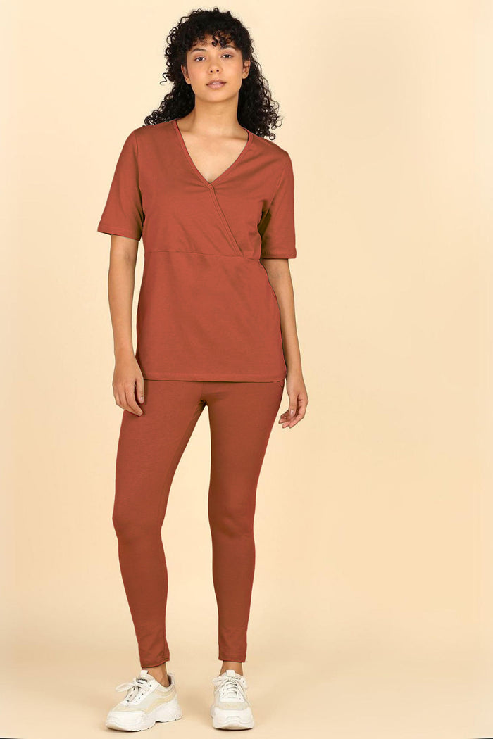 247 Zactive Rust Zipless Maternity Feeding Top - Front view showing breathable fabric and practical nursing access.