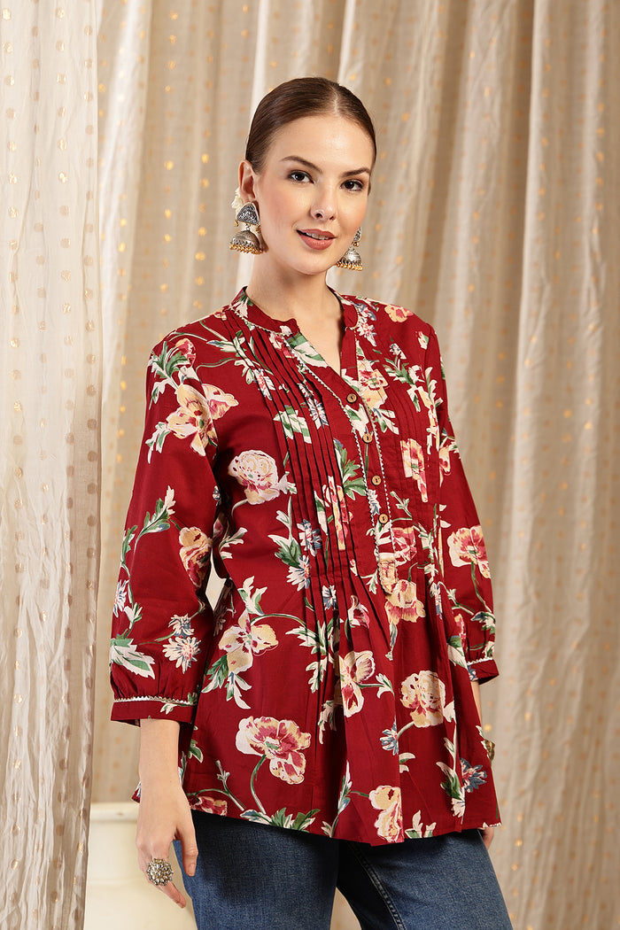 Maroon Printed Top; pleats offer extra room and flowy fit.