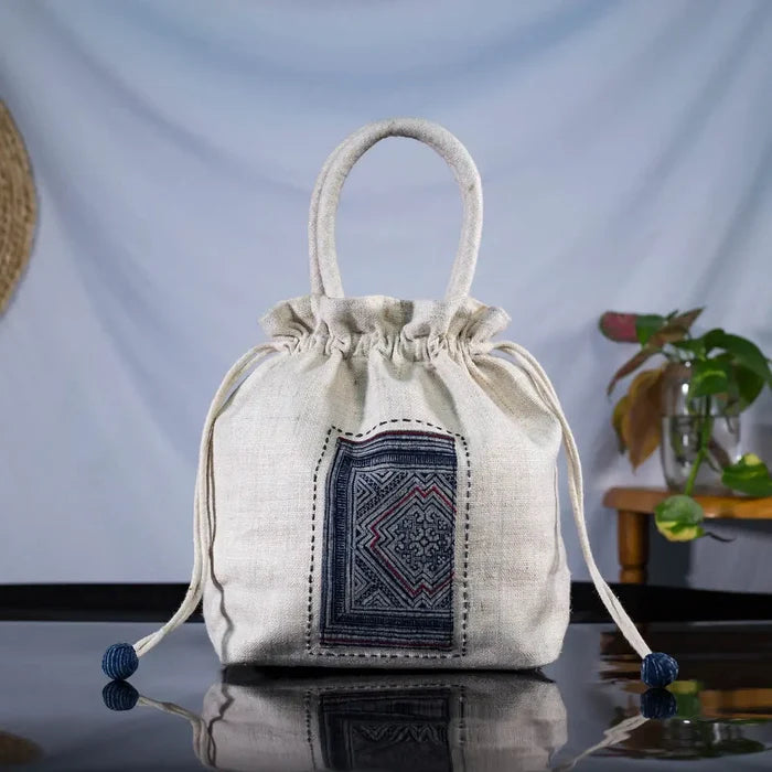White hemp bucket bag with H’Mong batik patch – standing display