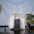 White hemp bucket bag with H’Mong batik patch – standing display