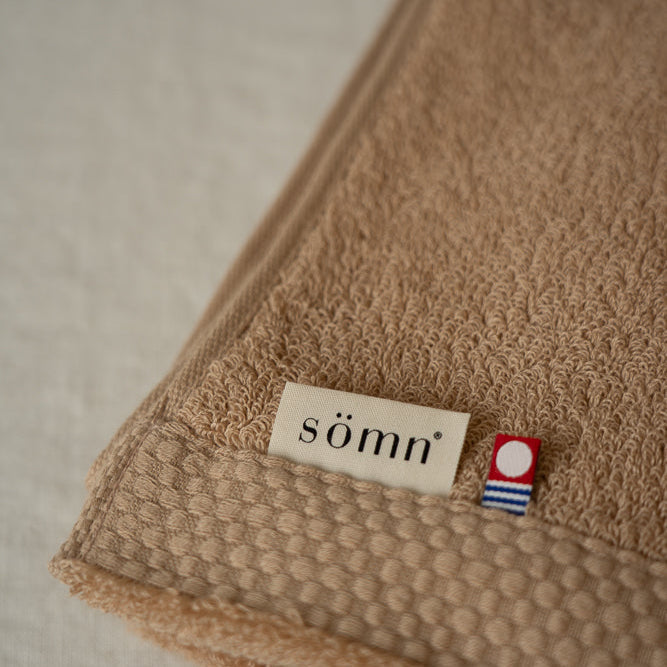 Sirocco towel with 'somn and Imabari' label