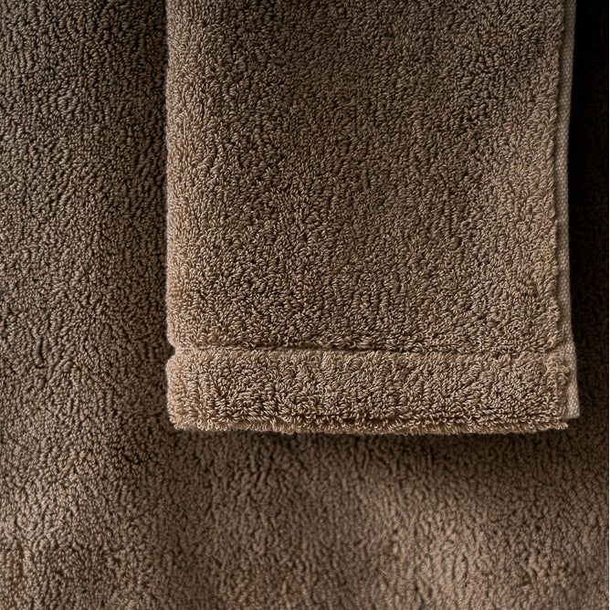 Close-up of brown towels with a textured surface