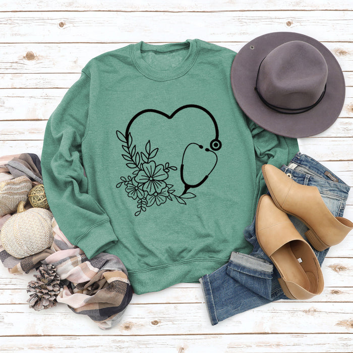 Light green sweater (black font) / S