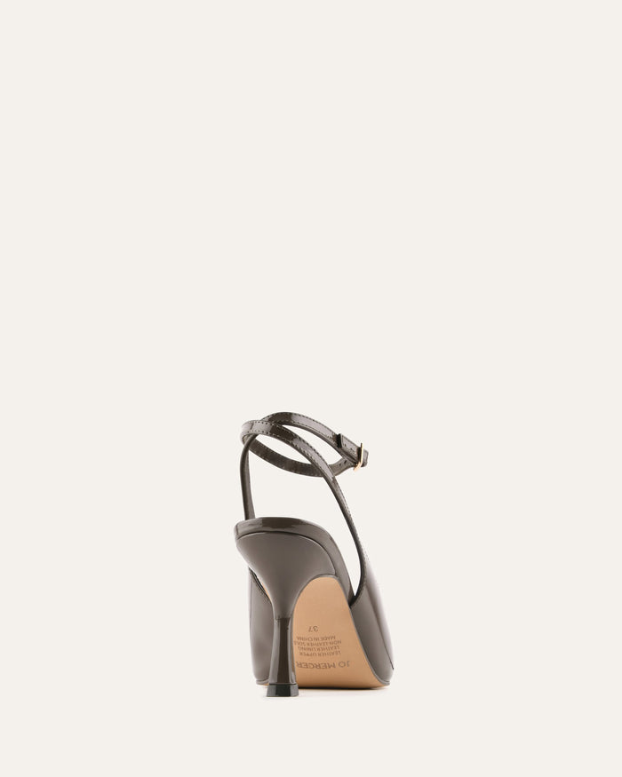 High-heeled shoe on a light beige background