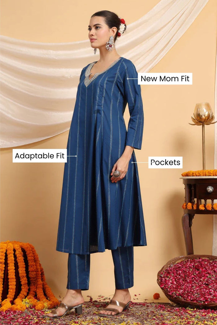Side profile of the Azure Blue Essence Suit Set, showing the smooth drape of the Cotton fabric.