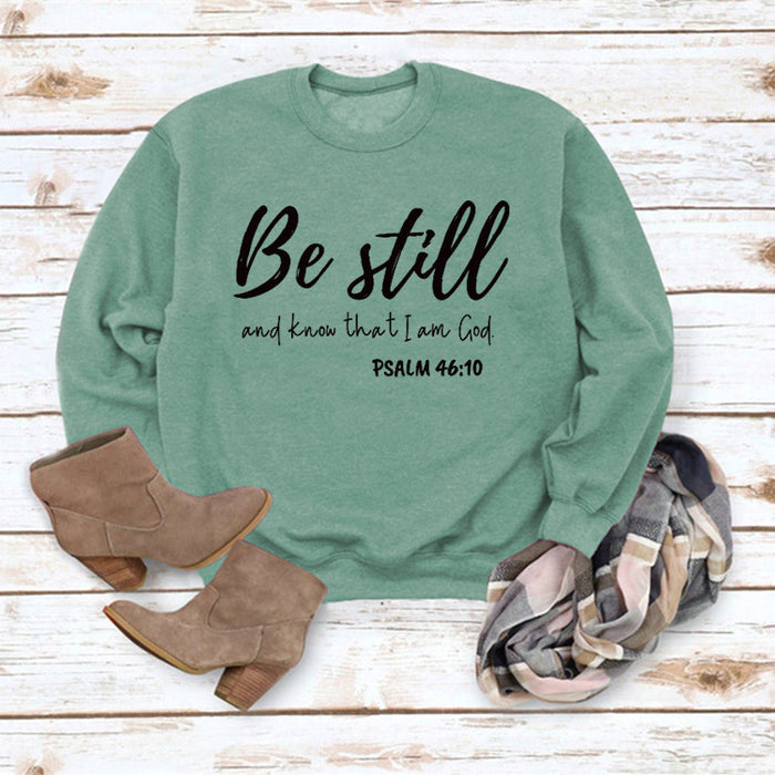 Light green sweater (black font) / S
