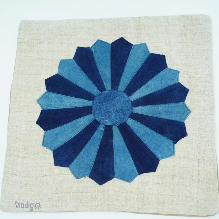 Close-up front of indigo dresden cushion on hemp fabric