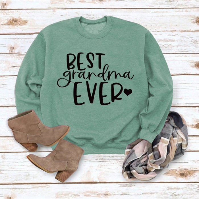 Light green sweater (black font) / S