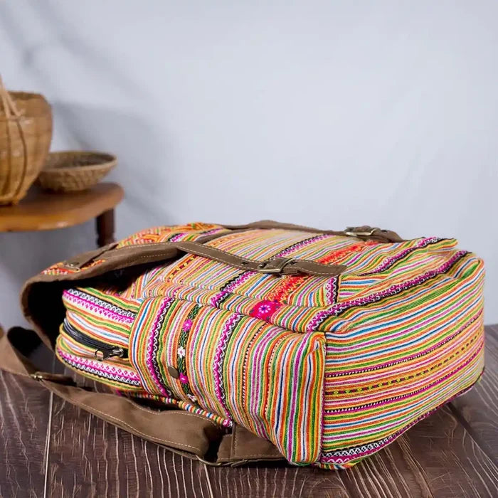 Vindigo orange embroidered cotton backpack angled view