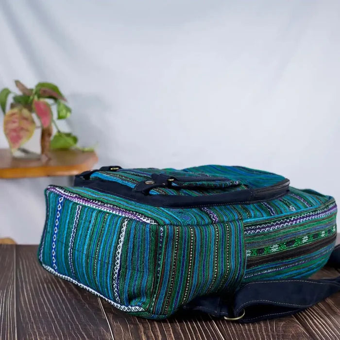 Vindigo green embroidered backpack bottom view with structured base