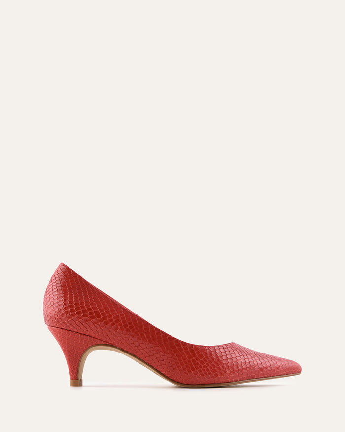 Red high-heeled shoe on a white background