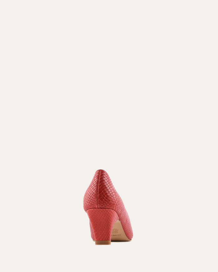 Red high-heeled shoe on a white background