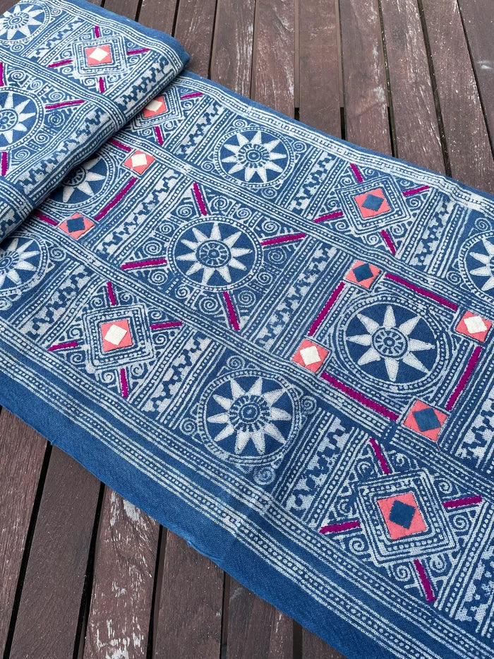 Block print batik with embroidery and appliqué on cotton in Sun pattern