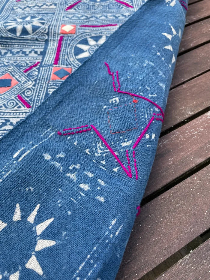 Block print batik with embroidery and appliqué on cotton in Sun pattern