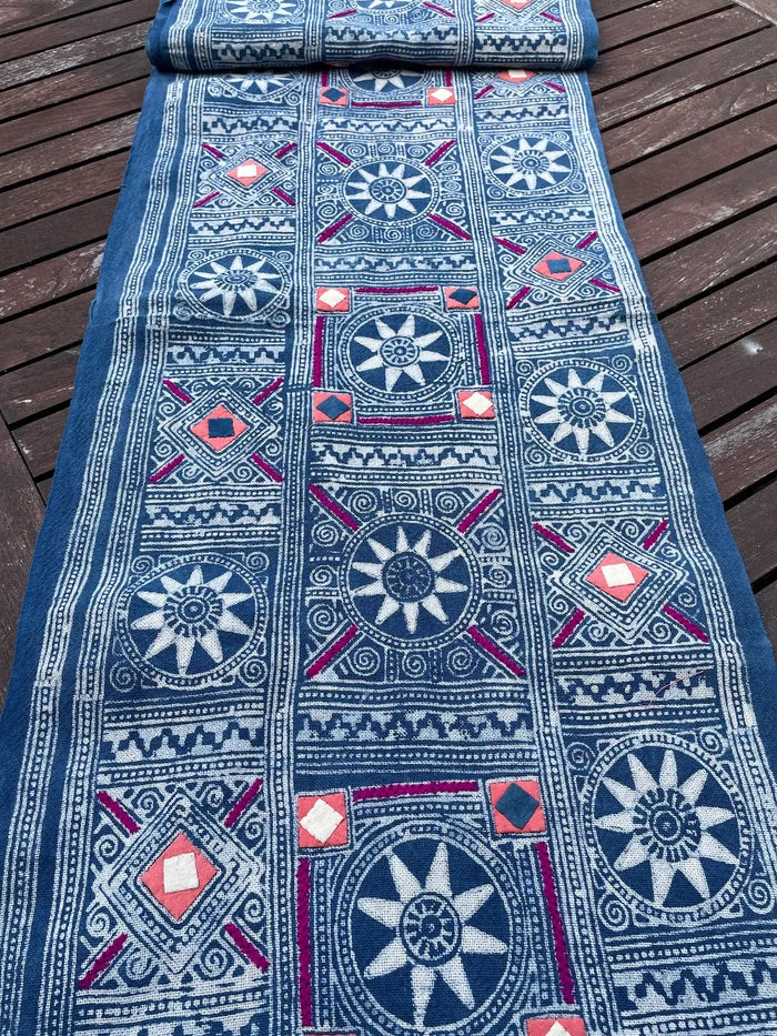 Block print batik with embroidery and appliqué on cotton in Sun pattern