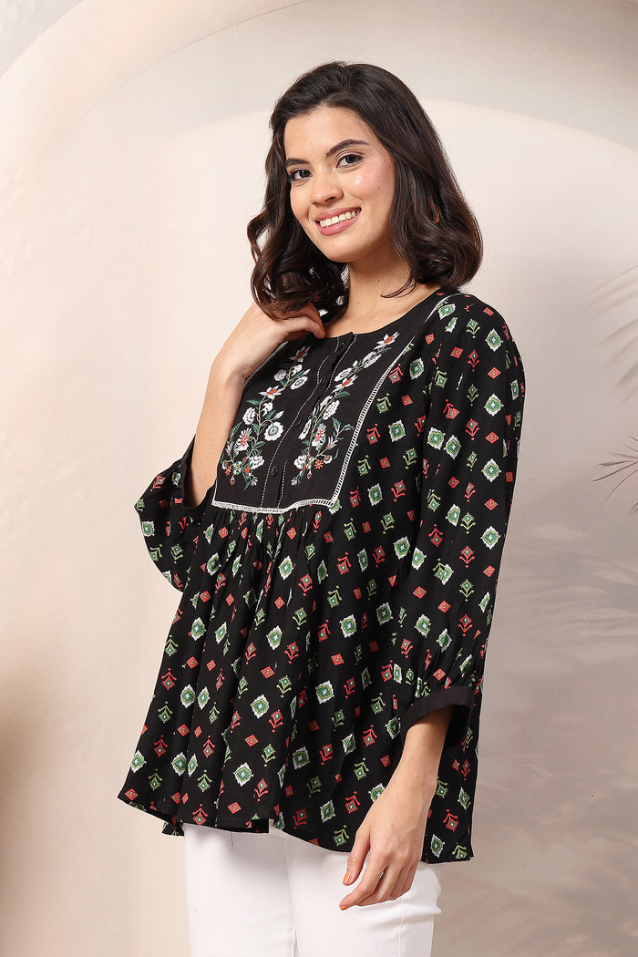 Bloom and Ease Top drape; drape offers shape and flowing fit.