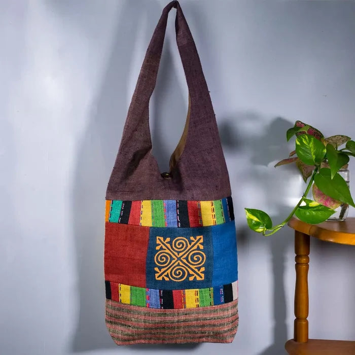 Vindigo shoulder bag brown hemp gold spiral patch hanging front view