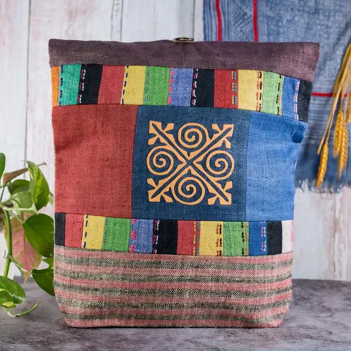 Vindigo shoulder bag brown hemp with gold spiral patch front view