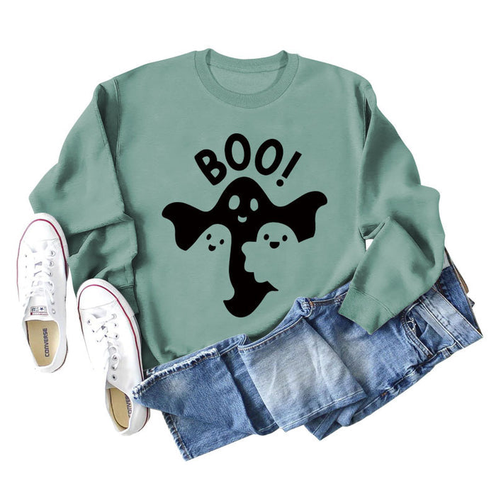 Light green sweater (black font) / S