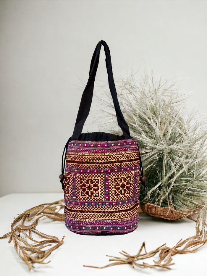 Brown and purple embroidery shoulder bag with string to close