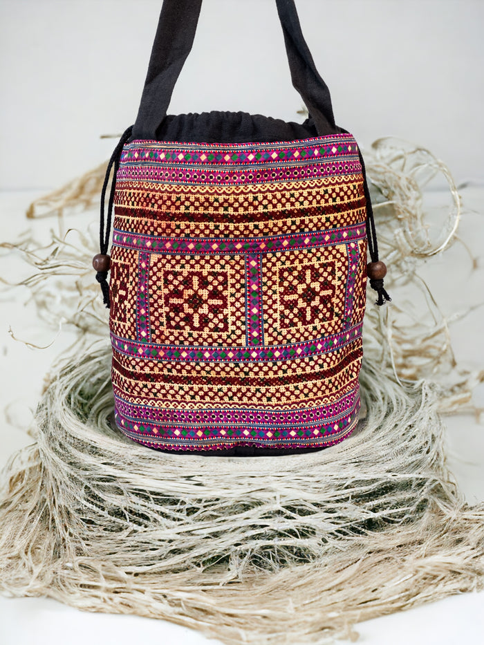 Brown and purple embroidery shoulder bag with string to close
