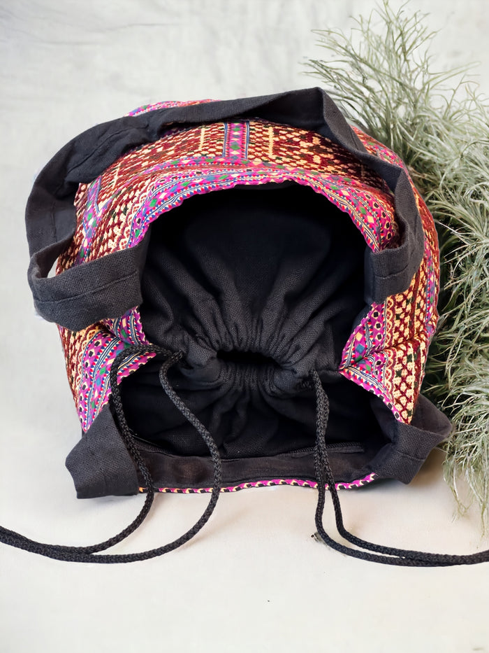 Brown and purple embroidery shoulder bag with string to close
