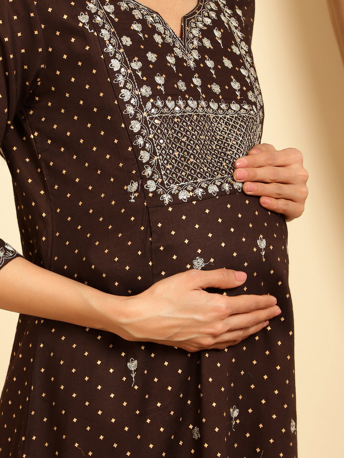 Side profile of the Brown sequins embroidered maternity kurti Kurti, demonstrating the comfortable A-line fit for pre...
