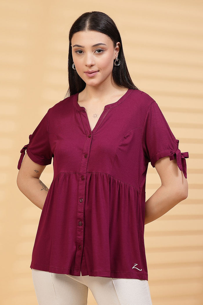 Burgundy Solid Top; generous cut accommodates growth during pregnancy.