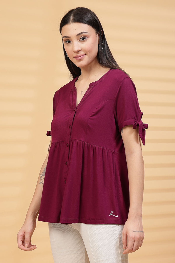 Burgundy Solid Top sleeves; sleeves offer coverage and relaxed fit.