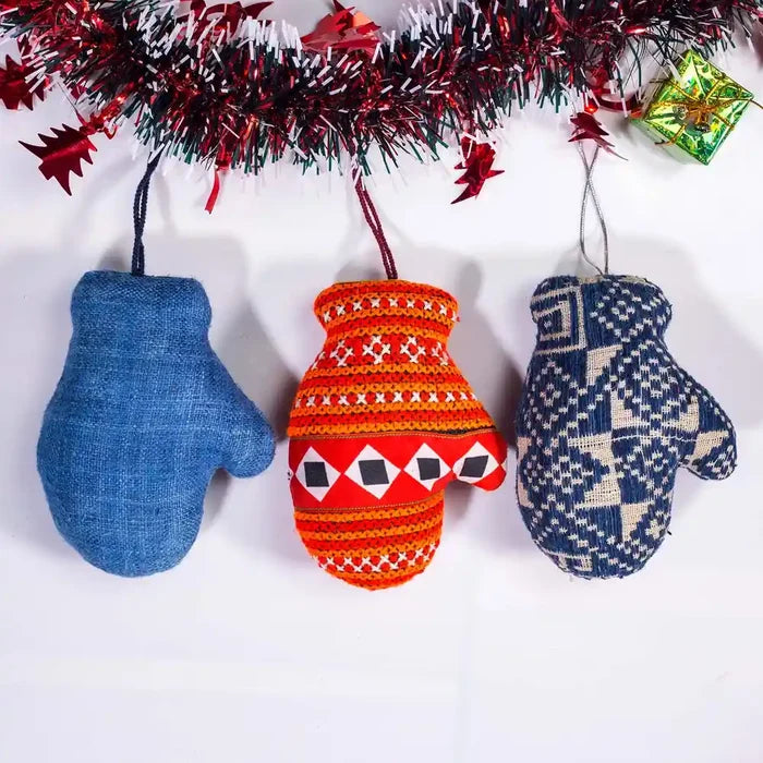 Vindigo assorted blue and red tribal embroidered Christmas ornaments hanging together