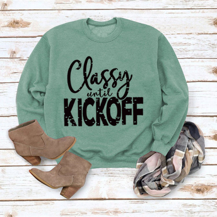 Light green sweater (black font) / S
