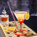 Cocktail glass with spiral straws
