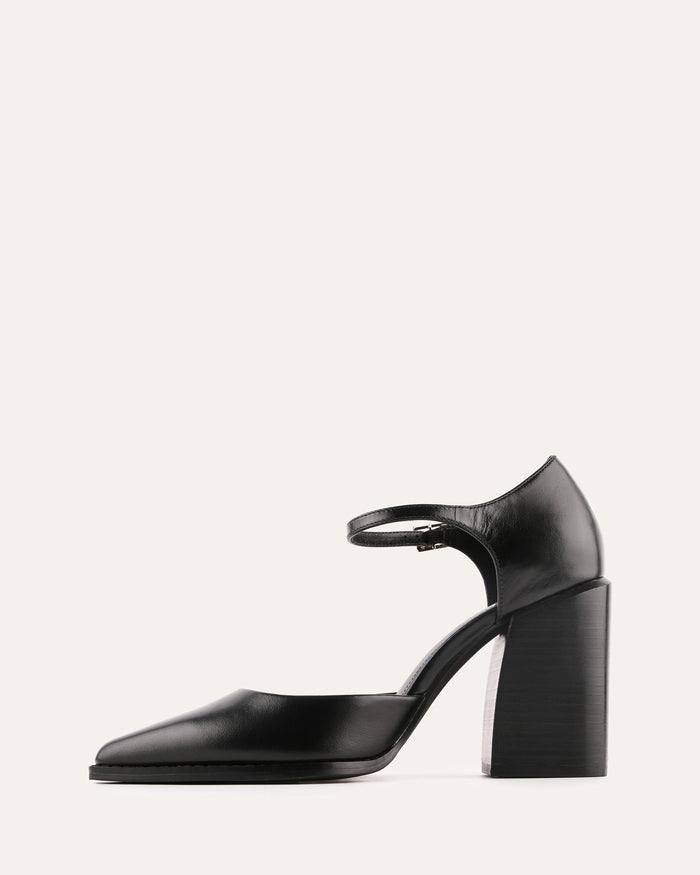 Black high-heeled shoe with a strap on a white background