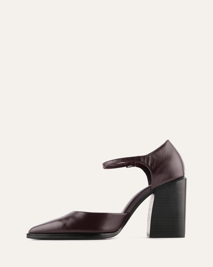Brown high-heeled shoe on a white background