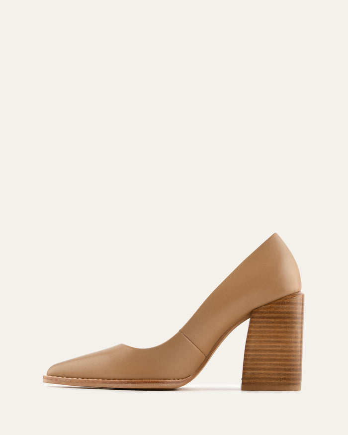 Beige high-heeled shoe on a white background