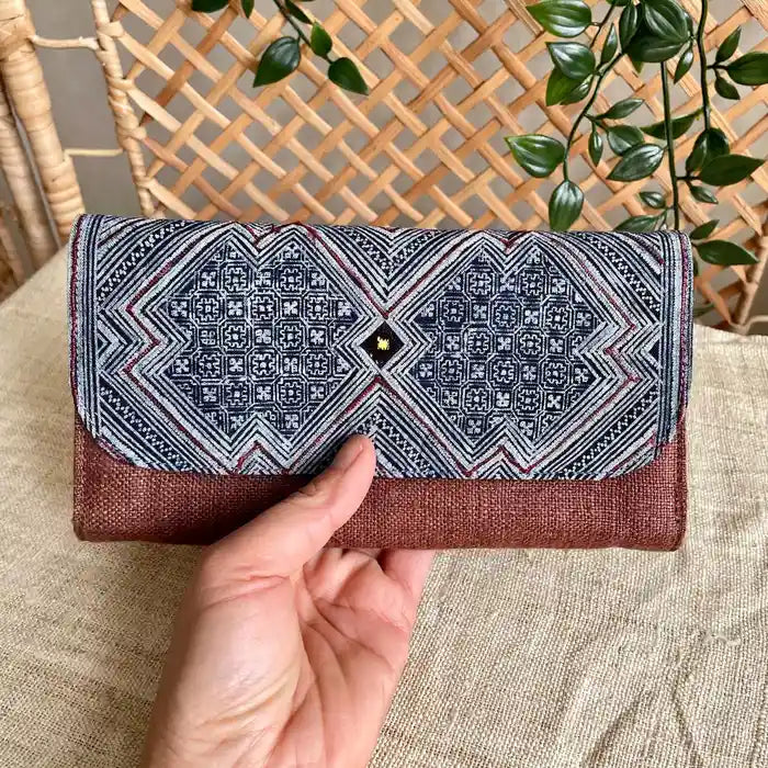 Vindigo long purse rust brown hemp ethnic front view with hand