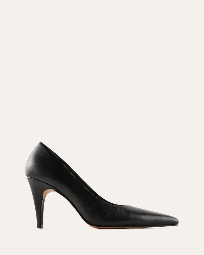 Black high-heeled shoe with lace detailing on a white background