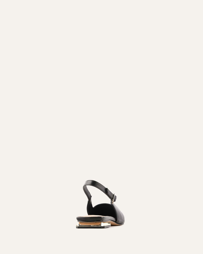 Black hair dryer on a white background