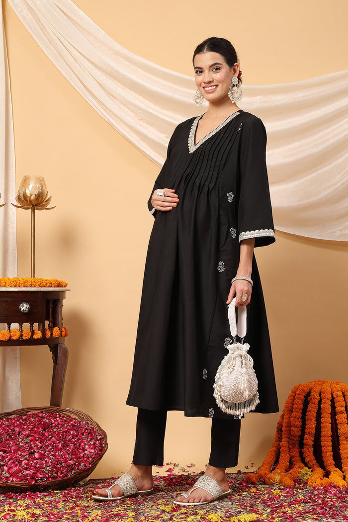 Elegant Black Festive Polyester Suit Set: Convenient Feeding for easy nursing, featuring a Relaxed Maternity silhouette.