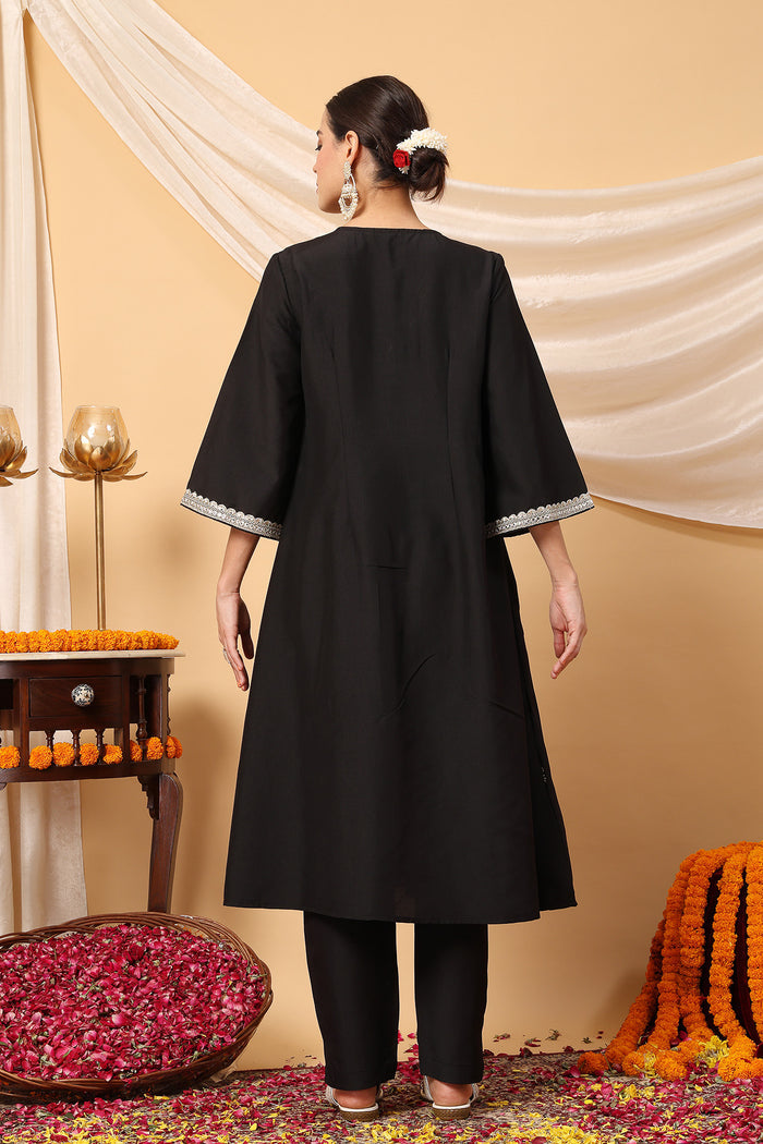 Close-up of the Elegant Black Festive pattern and soft Polyester fabric texture.