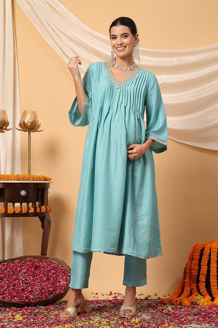 Elegant Turquoise Festive Polyester Suit Set: Convenient Feeding for easy nursing, featuring a Relaxed Maternity silhouette.