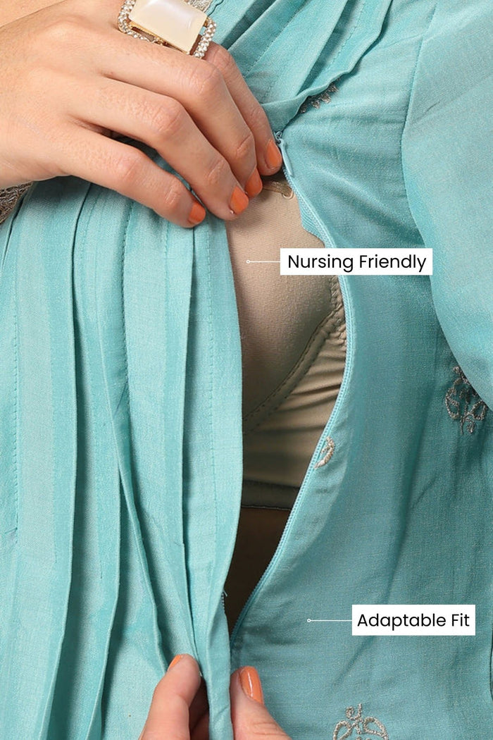 Full-length shot of model wearing the Elegant Turquoise Festive Suit Set. Emphasizes the comfortable Relaxed Maternity.