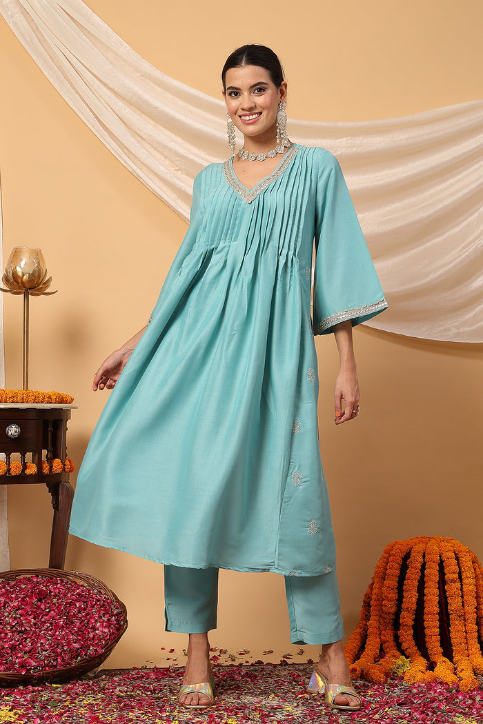 Comfort-focused image of the Elegant Turquoise Festive Polyester Suit Set, designed for style through pregnancy and postpartum.