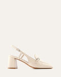 White sandal with a block heel on a white background