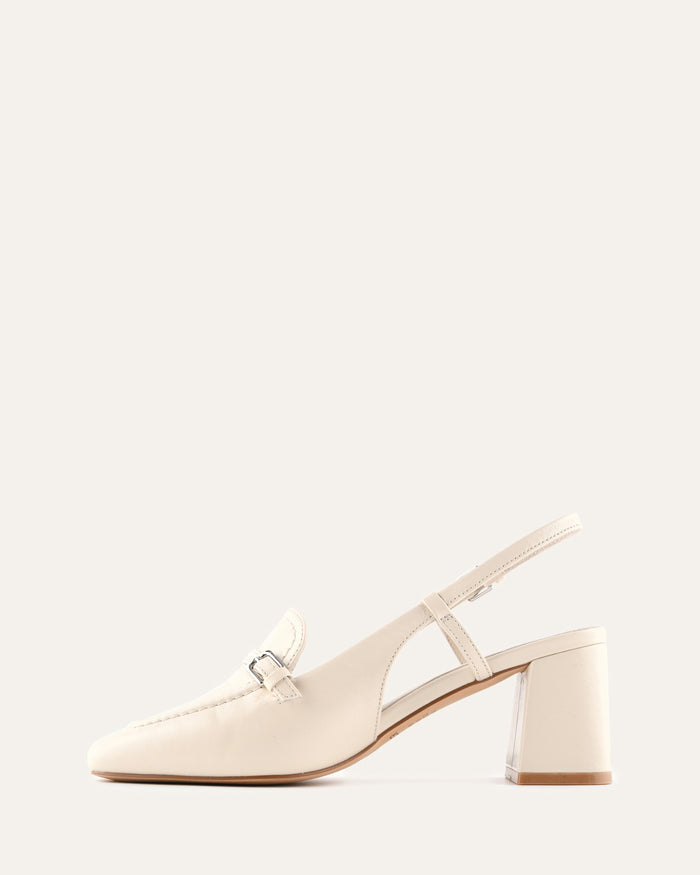 Beige high-heeled shoe on a white background