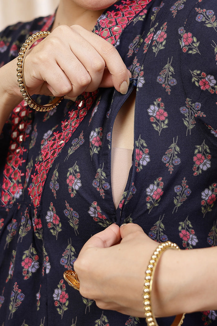 Full-length shot of model wearing the Embroidered Floral Cotton Kurta Set. Emphasizes the comfortable Flattering A-Line.