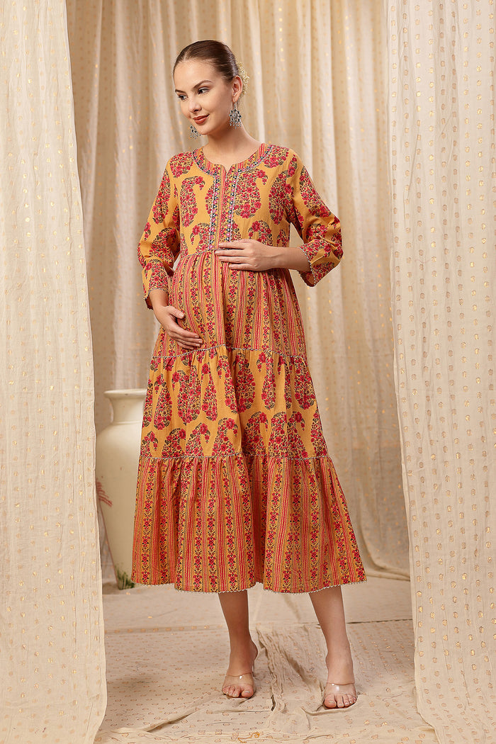 Full view of the Ethnic Cotton Tiered Kurti for Feeding Cotton Kurti on a model, highlighting its A-line fit and length.