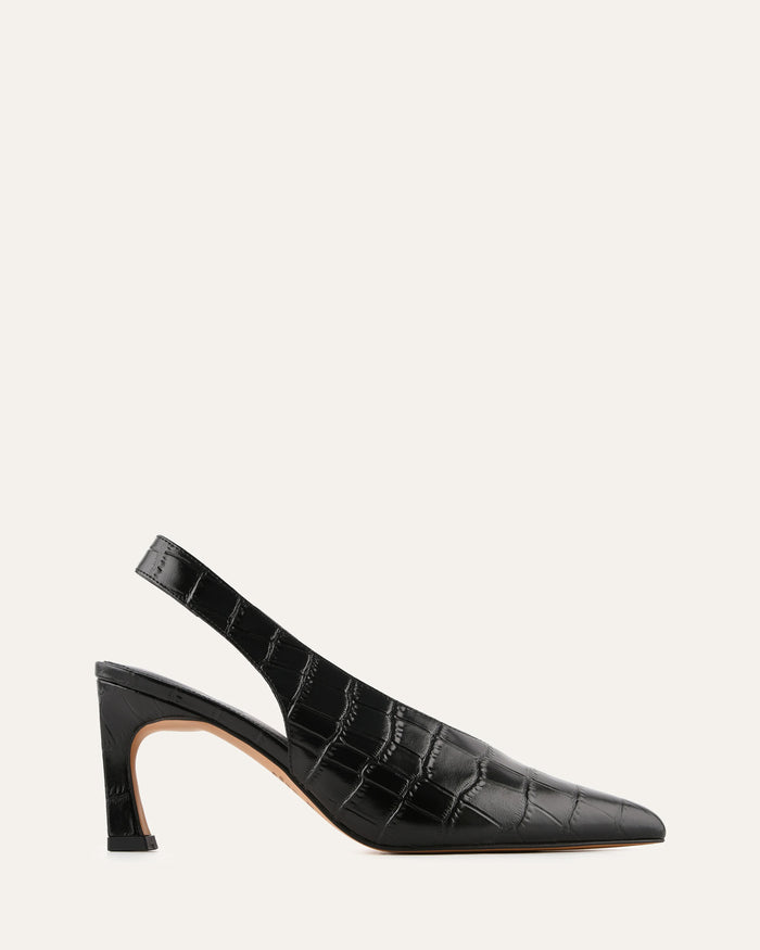 Black crocodile-patterned slingback shoe on a light gray background