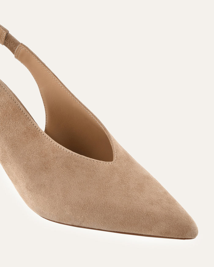 Beige suede pointed-toe slingback pump on a white background