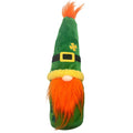 Dog with Fetchies® Lucky Gnome Dog Toy on a white background.